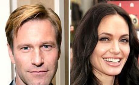 Aaron Eckhart Backs Angelina Jolie as Catwoman