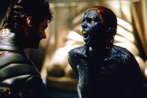 Wolverine claws Mystique