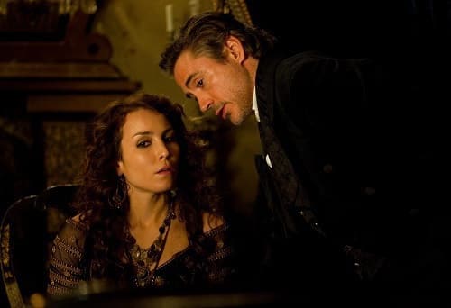 Noomi Rapace and Robert Downey Jr. in Sherlock Holmes: A Game of Shadows