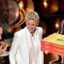 Brad Pitt Eats Pizza at Oscars