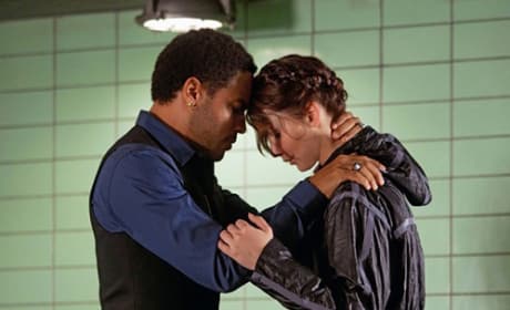 Lenny Kravitz and Jennifer Lawrence in The Hunger Games