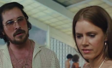 American Hustle Debuts Two Clips: Christian Bale Meets Amy Adams & Trouble