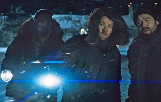 Adewale Akinnuoye-Agbaje and Joel Edgerton in The Thing