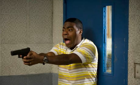 Tracy Rocks Out with his Glock Out