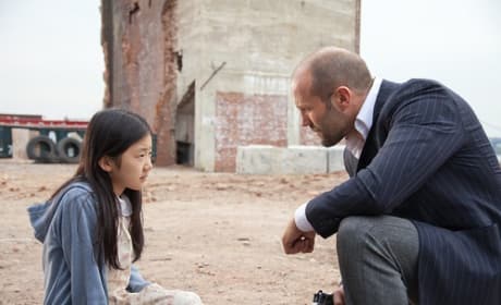 Jason Stathm and Catherine Chan in Safe