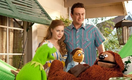 Kermit, Jason Segel and Amy Adams in The Muppets