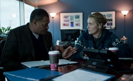 Kate Winslet and Laurence Fishburne in Contagion