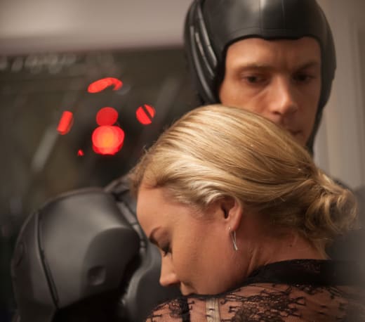 RoboCop Joel Kinnaman and Abbie Cornish