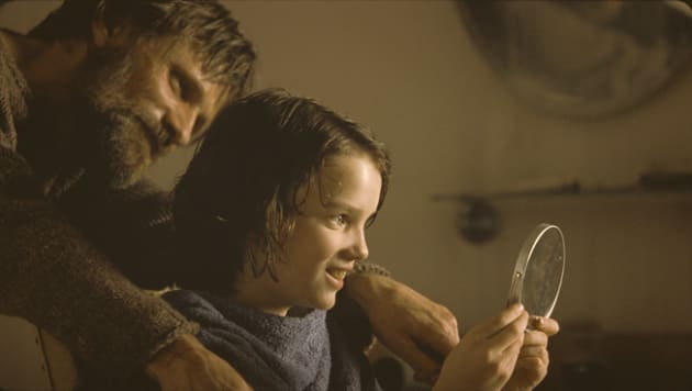 Father Gives Son a Haircut