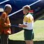 Mandela and Pienaar Chat on the Sidelines