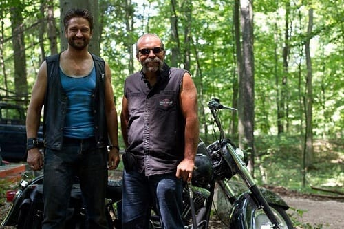 Gerard Butler and Sam Childers on Machine Gun Preacher Set
