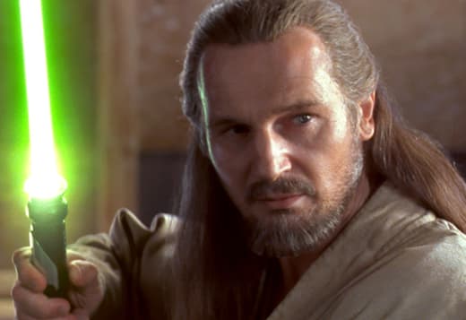 Liam Neeson as Qui-Gon Jin