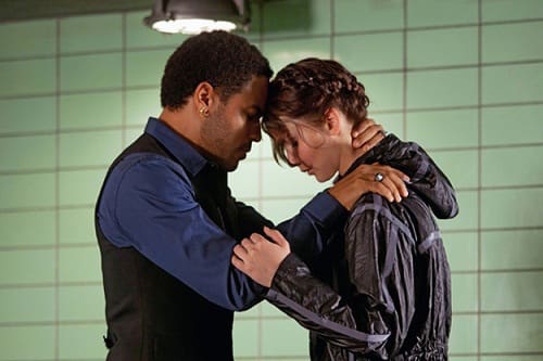 Lenny Kravitz and Jennifer Lawrence in The Hunger Games